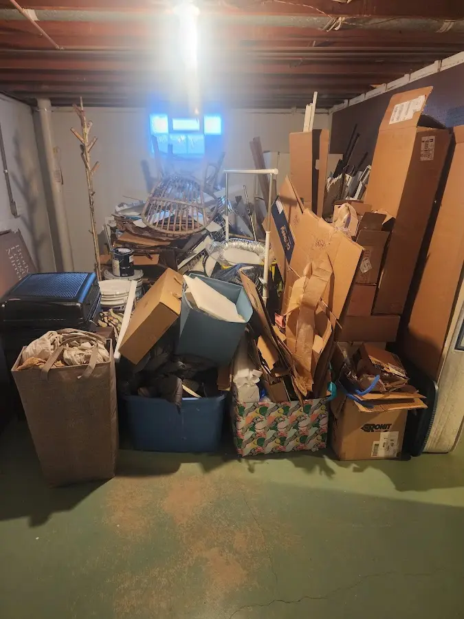 Roll-off dumpster container at job site for Yard Waste Dumpster Rental in Tahlequah